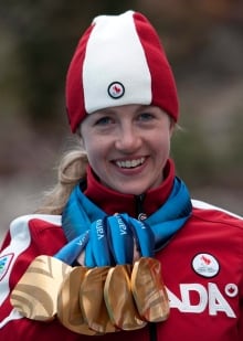 Lauren Woolstencroft and her five Paralympic gold medals