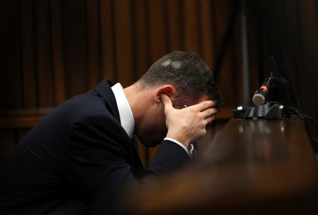 SAFRICA-PISTORIUS fingers in ears