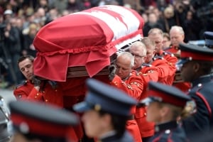 RCMP carry Flaherty casket Flaherty Funeral Apr 16 2014
