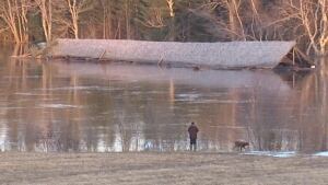 Covered bridge floats away
