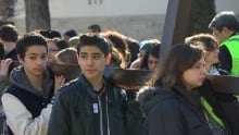 A procession walked in Osborne Village as part of the annual Public Way of the Cross event