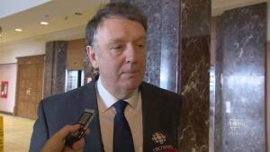 Frank Coleman outside caucus meeting