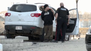 Man arrested after stolen SUV crashes onto steps of Saint John Law Courts building