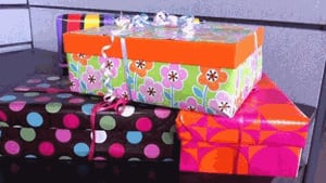 Some of the colourful shoeboxes being delivered to women's shelters for Mother's Day