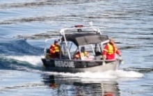 Slocan Lake canoe accident - search and rescue boat