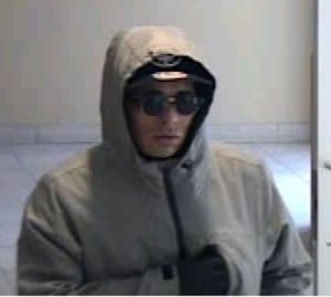 Police image of 'Mummy Bandit' bank robbery suspect