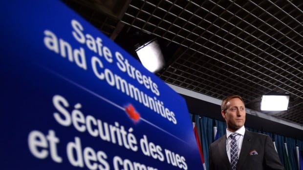 Justice Minister Peter MacKay leaves a news conference on Parliament Hill in Ottawa on Wednesday, June 4, 2014. The Conservative government has introduced legislation to criminalize the purchase of sexual services.
