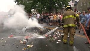 Firefighter douses bonfire