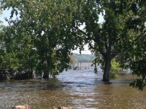 Campground and flooded play structure at Round Lake