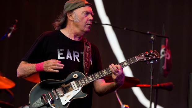 Neil Young and Crazy Horse cancel upcoming tour dates due to illness; Neil Young and Crazy Horse perform on stage at British Summer Time Festival at Hyde Park on July 12, 2014 in London, United Kingdom\. 