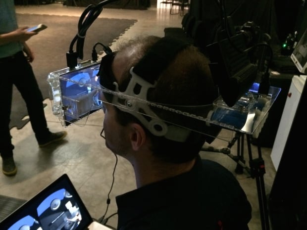 Aaron Hilton wears a Somnus VR headset