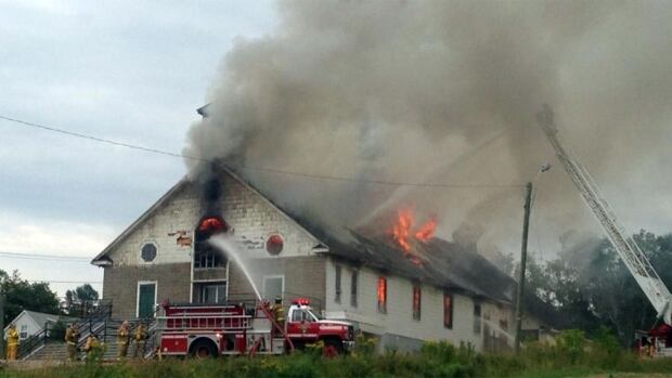 Former St. Theresa Child of Jesus Catholic Church on fire in Bathurst