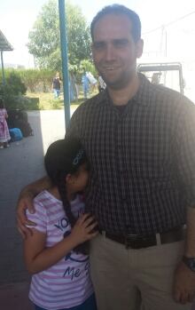 Salma Abuzaiter and her father at the border