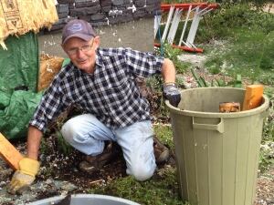 Ray Hill cleans up debris