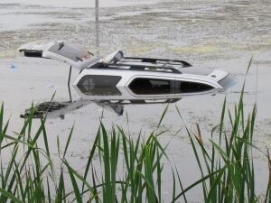 SUV crash in Saskatchewan slough