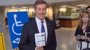 John Tory seen voting in advance