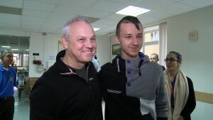 Dr. Oleh Antonyshyn with patient Nazar Derzhylo after eye surgery