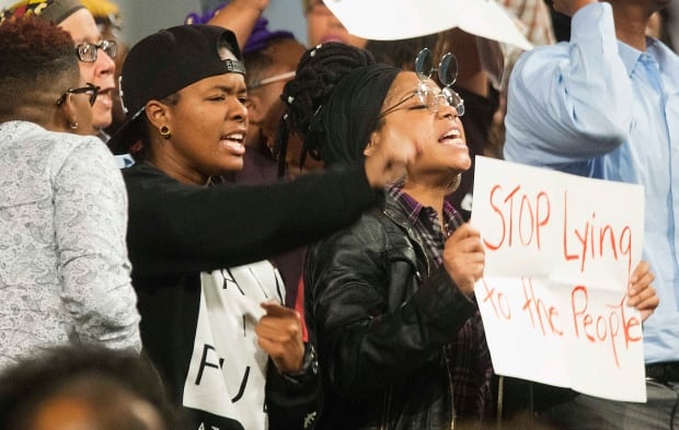 Protests interrupt Eric Holder