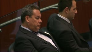 Councillor Mark Grimes sitting in chambers.