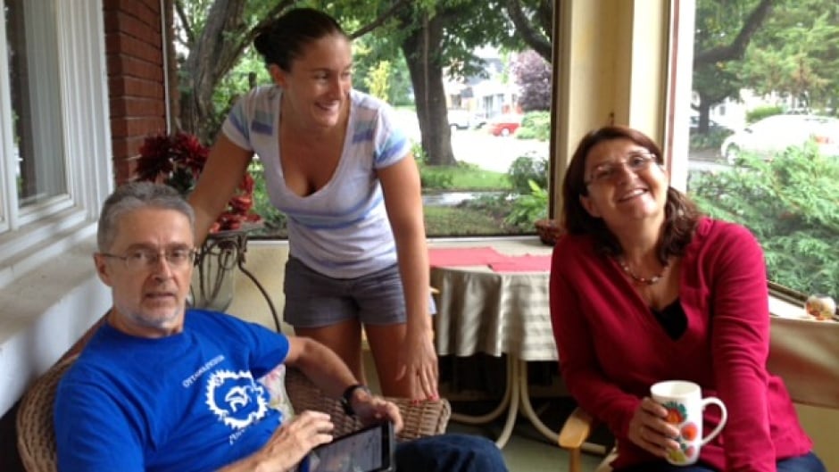 Allison Woyiwada (right) with husband Robert McMechan and daughter Marya.