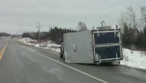 TCH Gander winds, upturned vehicle