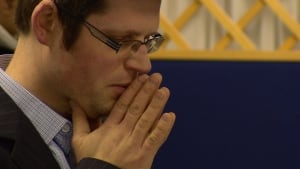 Man praying in synagogue