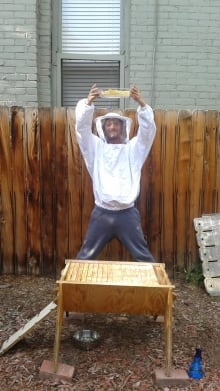 Tristan Copley Smith displays bees
