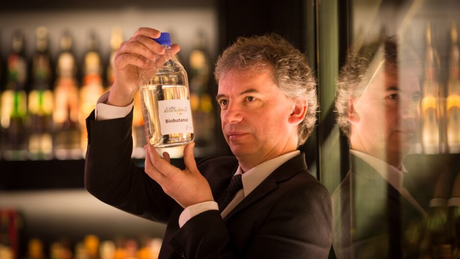 Martin Tangney, founder of Celtic Renewables, shows the first sample of bio-butanol.