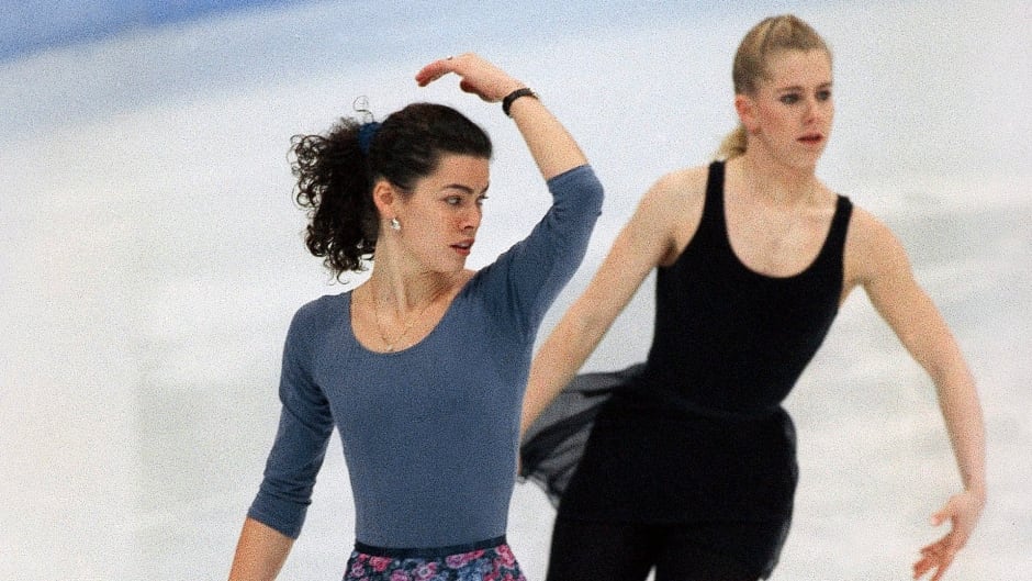 In this Feb. 22, 1994 file photo, American figure skaters Nancy Kerrigan (left) and Tonya Harding work out during an Olympic practice session at Hamar Olympic Amphitheater in Hamar, Norway.