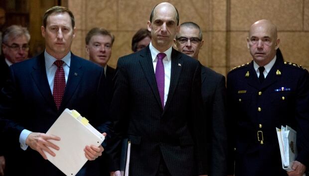 Peter MacKay (left), Steven Blaney and Bob Paulson (right)