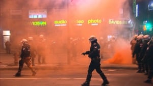 police officer smoke bomb montreal protest