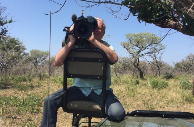 Cameraman Richard Devey filming in Kruger National Park