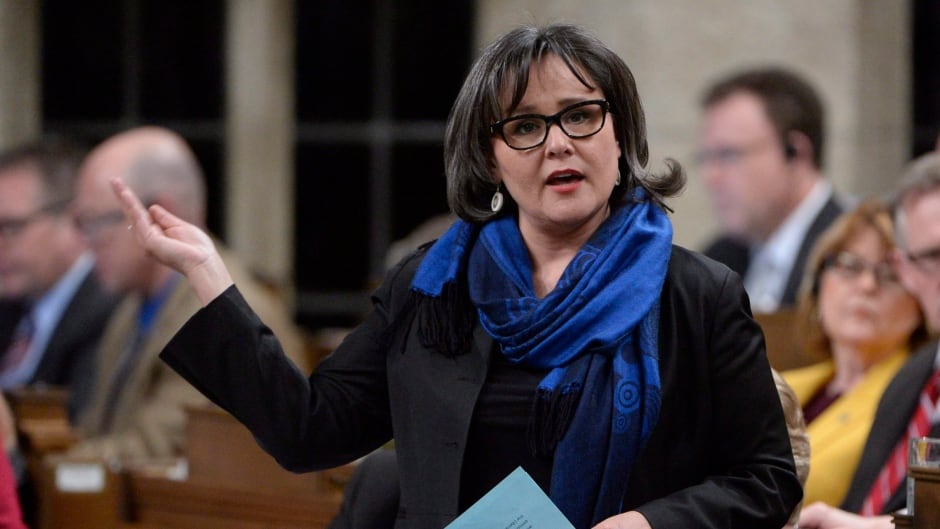 Environment Minister Leona Aglukkaq answers a question during Question Period .