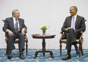 Barack Obama talks with Raul Castro