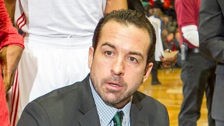 Scott Morrison, head coach of the Maine Red Claws talks to his team during a time-out. Morrison was recently named the NBA D-league's 'Coach of the Year'. Scott Morrison