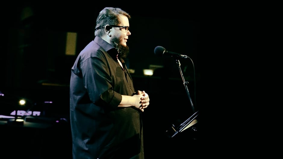 Shane Koyczan's hard-hitting spoken word poetry touches on social issues like bullying.