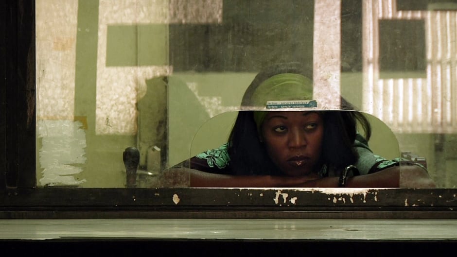 'Elephant’s Dream' is a portrait or workers in DR Congo. Here is Henriette from the film, a female post office clerk in the dilapidated central post office, in Kinshasa.