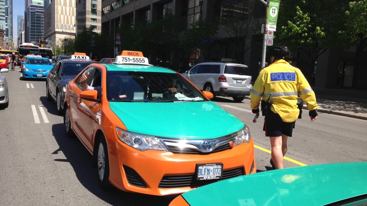 Checker Cab London >> Uber-protesting Toronto taxi drivers block streets around ... Checker Cab London >> Uber-protesting Toronto taxi drivers block streets around ...
