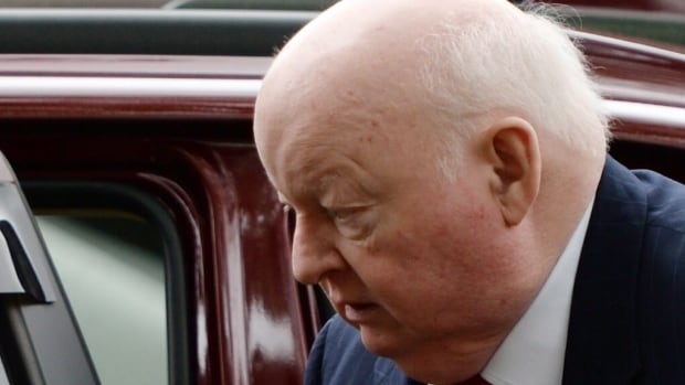 Suspended Senator Mike Duffy heads to court in Ottawa on Tuesday, June 2, 2015. Duffy faces 31 charges, including fraud, breach of trust and bribery.