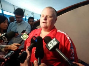 Rob Ford, wearing a red jumpsuit