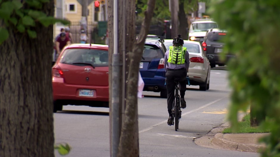 Car and bicycle commuters in Halifax.