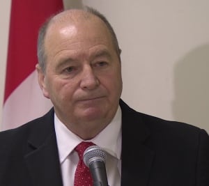 Finance Minister Allen Roach