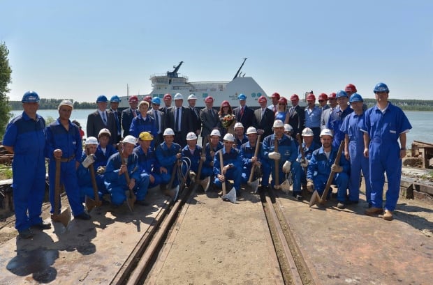 Workers and officials at MV Legionnaire launch