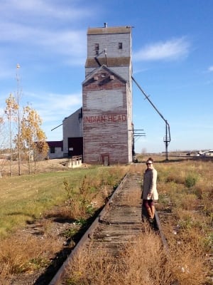 Ali Piwowar in front of Indian Head grain elevator