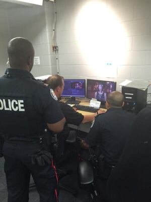 Police reviewing the footage