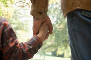 child holding hand
