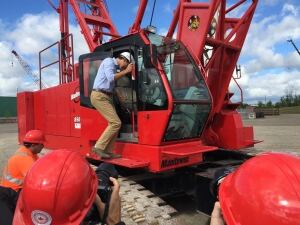 Justin Trudeau climbs into a crane in Oakville, Ont.