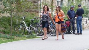 Women walk through University of Saskatchewan campus