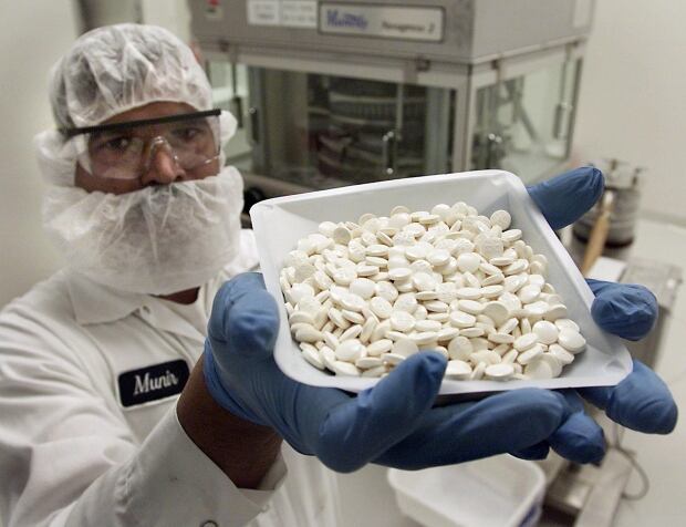 The global drug manufacturing supply chain is so complex, it's difficult to track the origins of a particular medication. (Kevin Frayer/Canadian Press)