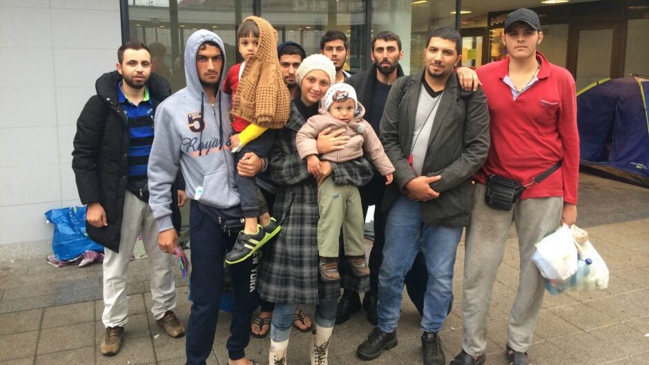 Syrian refugee Ahmed Yusef al Khalid (third from right) with his family and friends at a train station in Budapest, Hungary, Sept. 11, 2015.